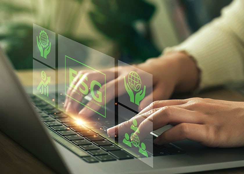 Laptop with ESG investing symbols
