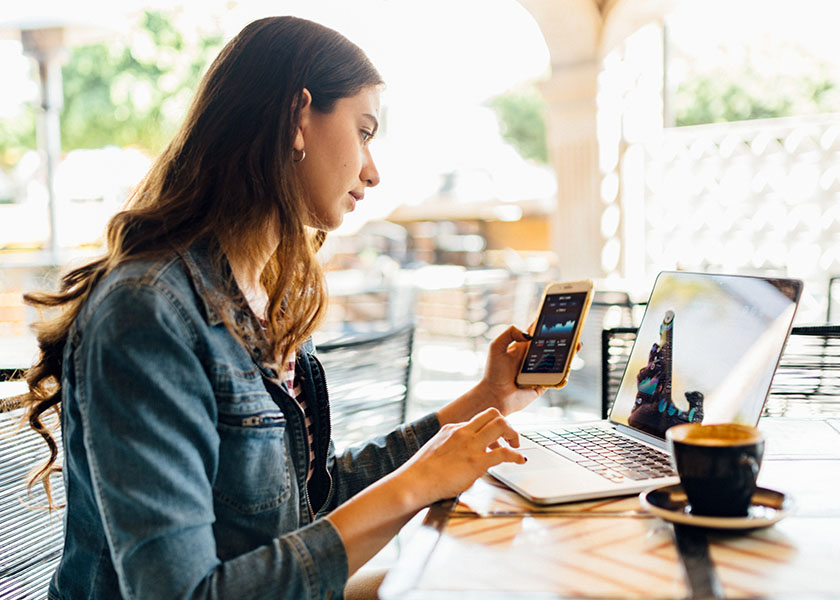 Woman checking crypto news