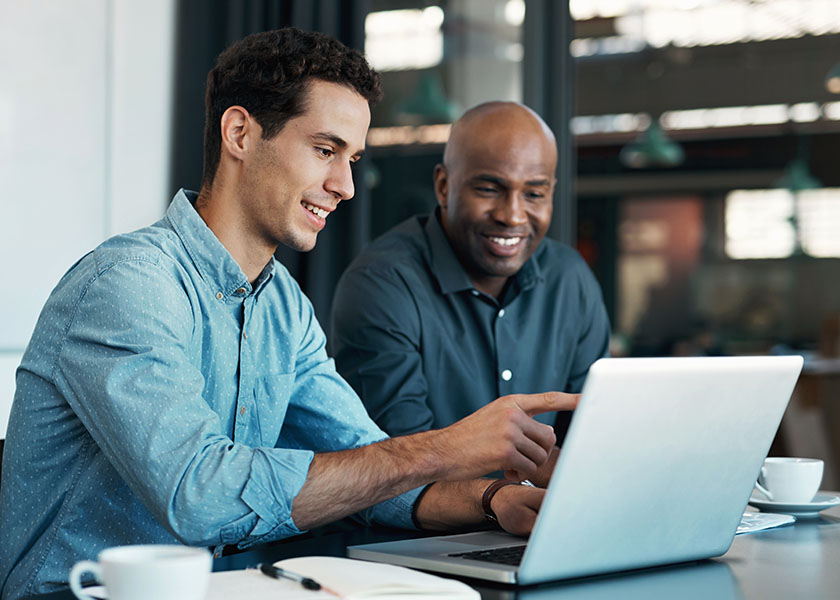 Businessmen at computer